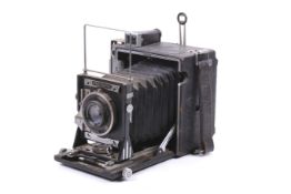 A Graflex Speed Graphic rangefinder press camera. With a Ross London 136mm f4.