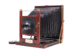 A London Stereoscopic Co Antique Mahogany and Brass Full Plate Camera.