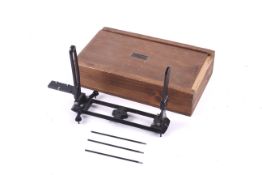 A W.Ludolph sight surveyors instrument. Serial No. 35987. In fitted wooden case.