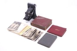 A collection of mainly military photographs in three albums and loose.