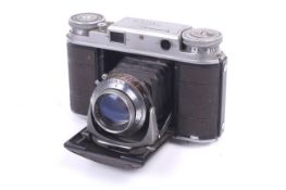 A Voigtlander Vito II 35mm rangefinder camera. With a Voigtlander 50mm f2 Ultron lens.