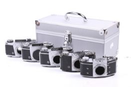Five Ihagee Dresden Exakta 35mm SLR camera bodies.