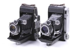 Two KMZ 6x9 medium format folding rangefinder cameras. To include a Moskva/Mockba 2 with a 110mm f4.