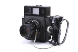 A Mamyia Super 23 medium format rangefinder press camera. With a Mamiya Sekor 100mm f3.