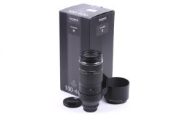 An Olympus OM System M.Zuiko Digital ED 100-400mm f5-6.3 IS mirrorless camera lens.