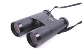 A pair of Zeiss 10 x 40 B West Germany binculars. With makers strap, case and rear cap.