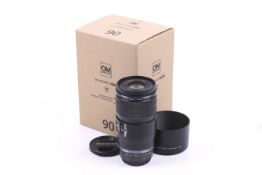 An Olympus OM System M.Zuiko Digital ED 90mm f3.5 Macro IS Pro mirrorless camera lens.