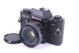 A Mamiya ZE-2 Quartz 35mm SLR camera. Black.