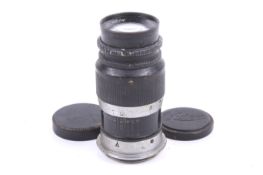 A Leitz Wetzlar 9cm (90mm) f4 Elmar LTM lens. Black. Serial No. 372966. With front and rear caps.