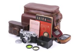 A Leica IIIC 35mm rangefinder camera. 1948, chrome, serial number 460189.