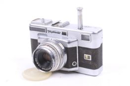 A Voigtlander Vitessa T 35mm rangefinder camera. Chrome. With a Voigtlander 50mm f2.
