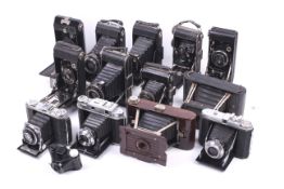 A collection of mostly folding cameras.