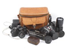 A Minolta X700 camera outfit.