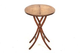 An early 20th century mahogany folding 'coaching' table.