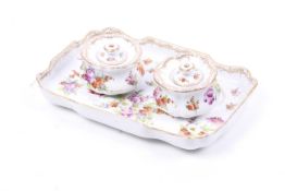 A 19th century German three piece porcelain ink well desk stand set.