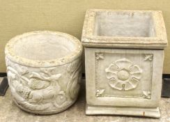 Two reconstituted stone garden planters/pots.