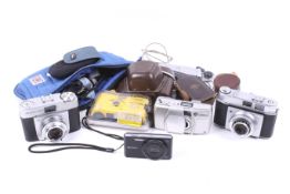 A collection of five cameras.