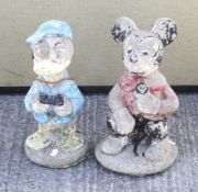A pair of reconstituted stone garden ornaments modelled as Disney characters.