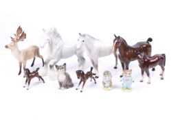 A collection of mostly Beswick ceramic animal figures.