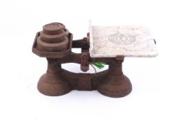 A set of vintage shop kitchen balance scales by Yandell & Son, Bristol. With five weights.