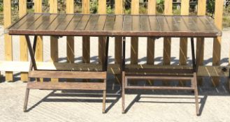 A wooden folding patio table.