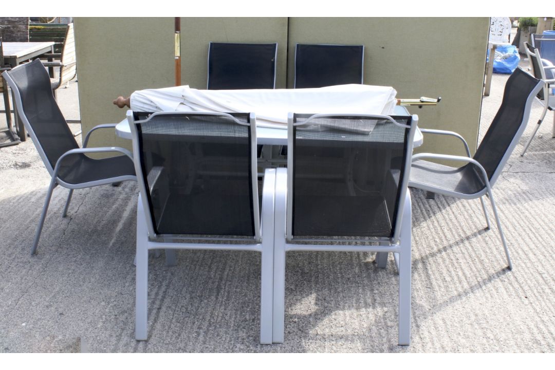 A set of six garden chairs, a rectangular table and a parasol. - Image 1 of 2