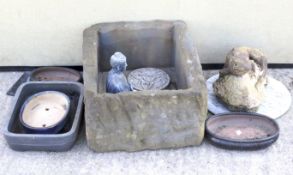 A collection of garden pots and ornaments.