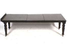 A vintage wooden adjustable day bed.
