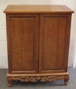 A contemporary Chinese style wooden drinks cabinet.