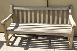A 'Gloster' slat-back garden bench.