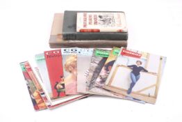 A small assortment of photography related books and magazines.