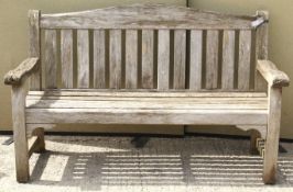 A 'Wood Furn' slat-back garden bench.