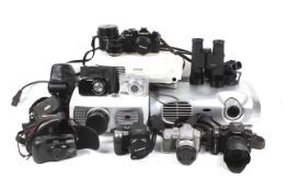 Box of assorted film and digital cameras plus three LCD projectors.