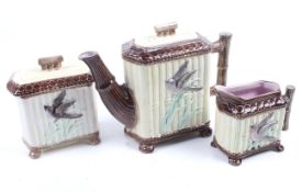 A Victorian three-piece majolica tea set.