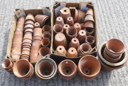 A large collection of terracotta garden pots. In various smaller sizes, approx.
