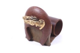 A Gucci leather and gilt metal equestrian book holder.