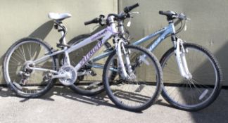 Two Specialized mountain bikes.