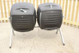 A 'Lifetime' garden composter. Having with two rotating bins with hinged lids.