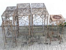 Eight metal open-square plant stands.