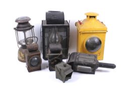An assortment of lanterns and carriage lights.
