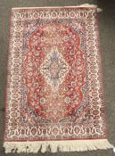Two assorted Persian style wool rugs.