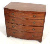 A 20th century mahogany bow fronted chest of drawers.