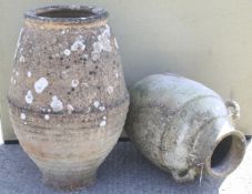 Two large terracotta urns. One with twin handles. Max.