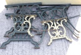 Three sets of vintage cast metal garden table ends. All painted green with scrolling details, Max.