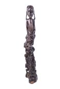 An African hardwood Makonde tribe carved sculpture. A tower of people.