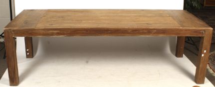 A contemporary large wooden dining table. Raised on square supports, H76.5cm x W249.5cm x D105.
