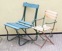 A metal framed garden chair and child's folding garden chair.