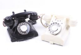Two vintage bakelite rotary telephones. Including a black pyramid GPO telephone with no.