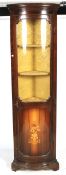 An Edwardian mahogany corner display cabinet.