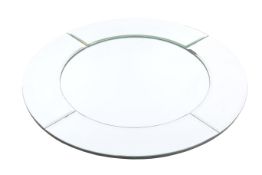 A contemporary round bevel edge frameless wall mirror. Mounted on board.